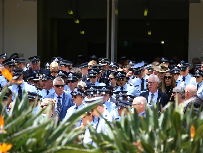 Mourners at the memorial service with full police honours for constables Rachel McCrow and Matthew Arnold at Brisbane Entertainment Centre. Picture: David Clark