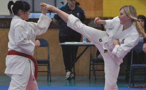 Hannah Mossman on her way to winning the Female Colts State Champion title for Shotokan Karate at the Tannum Sands High School Performance Centre. Picture: Submitted