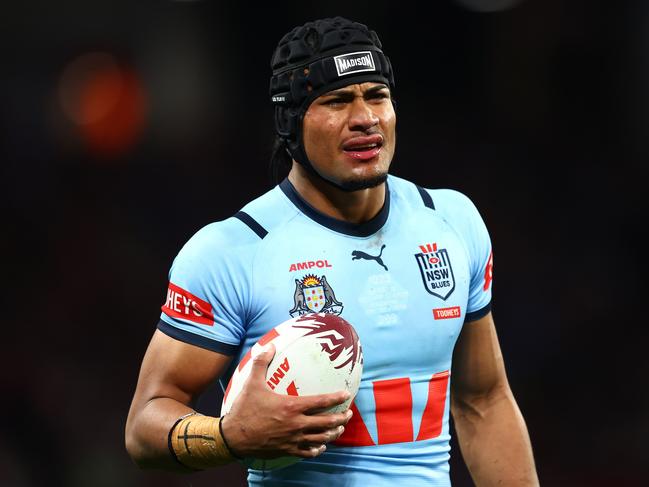 BRISBANE, AUSTRALIA - JULY 17:  Stephen Crichton of the Blues reacts during game three of the 2024 Men's State of Origin series between Queensland Maroons and New South Wales Blues at Suncorp Stadium on July 17, 2024 in Brisbane, Australia. (Photo by Chris Hyde/Getty Images)