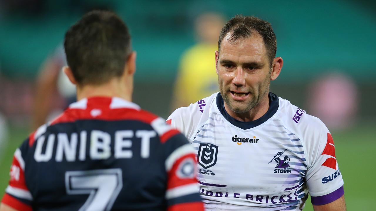 Cameron Smith of the Storm and Cooper Cronk of the Roosters shake hands after the preliminary final