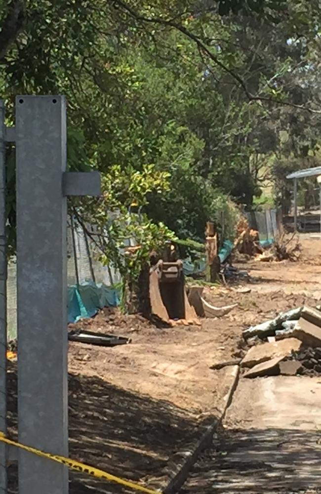 Small perimeter trees are removed in preliminary works at the Kate St side of the former Goodman Fielder Bakery at Carina. Picture: Brian Bennion