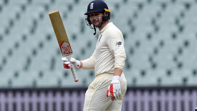 Mark Stoneman celebrates a half century against the CA XI.