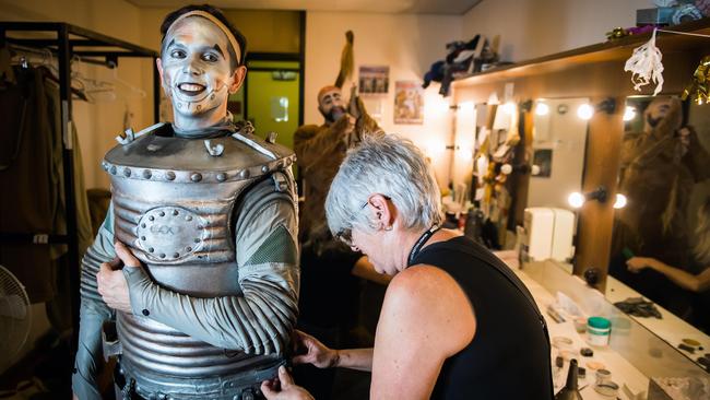 Alex Rathgeber, who plays Tinman, assisted by crew member Shona Webster in his dressing room. Picture: Tom Huntley