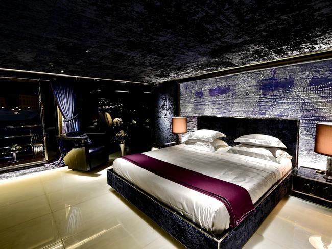 Each bedroom has a colour theme ... this one even has a matching ceiling. Picture: Burgess Yachts