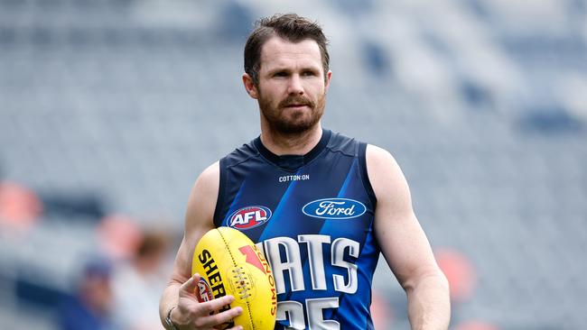 Patrick Dangerfield watches on at Geelong training. Picture: Dylan Burns/AFL Photos via Getty Images