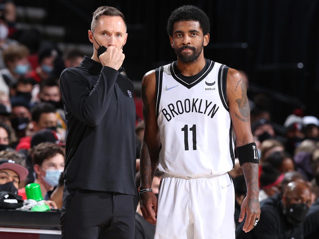 Kyrie Irving with Nets head coach Steve Nash. Irving has barely played this season due to being unvaccinated against Covid-19. Picture: Sam Forencich/NBAE via Getty Images