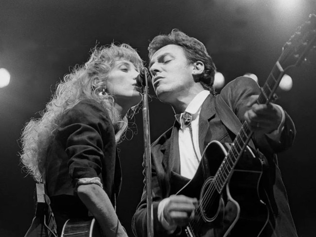 Patti Scialfa and Bruce Springsteen perform in 1988. John Atashian/Getty Images