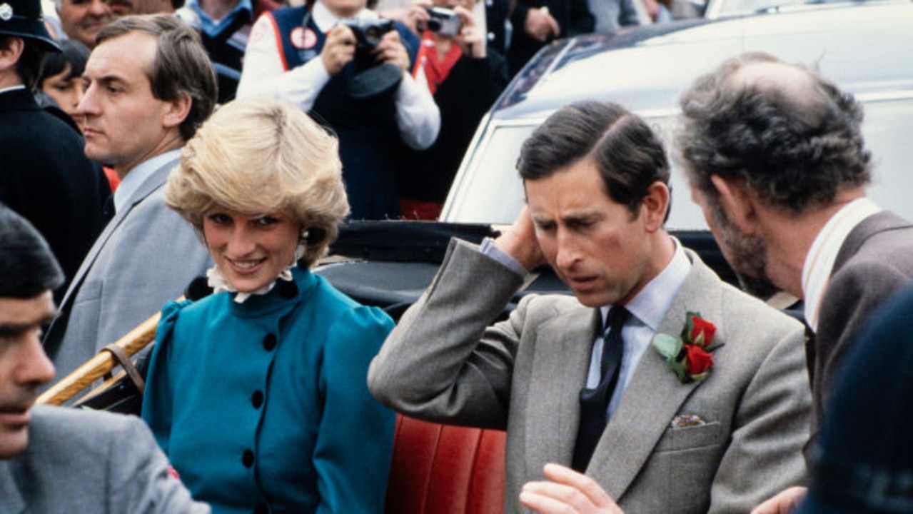 Prince Charles and Princess Diana in an open-top carriage with police bodyguard Barry Mannakee to the left of Diana. Picture: David Levenson/Getty Images.