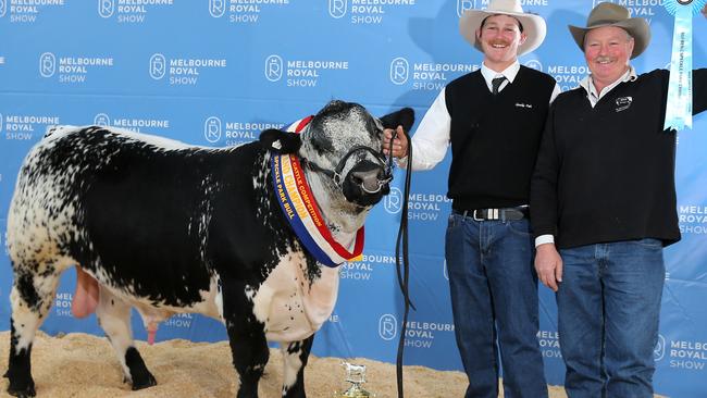 Royal Melbourne Show, cattle judging, Murray and his father Andrew van der Drift, with the grand champion Speckle Park Bull, Picture Yuri Kouzmin