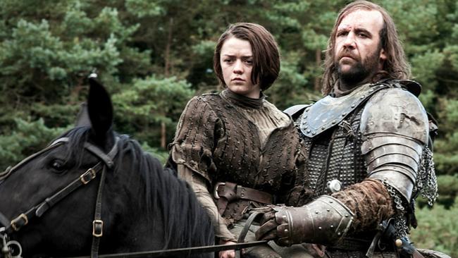 On set ... Maisie Williams as Arya Stark and Rory McCann as Sandor "The Hound" Clegane in Game of Thrones.