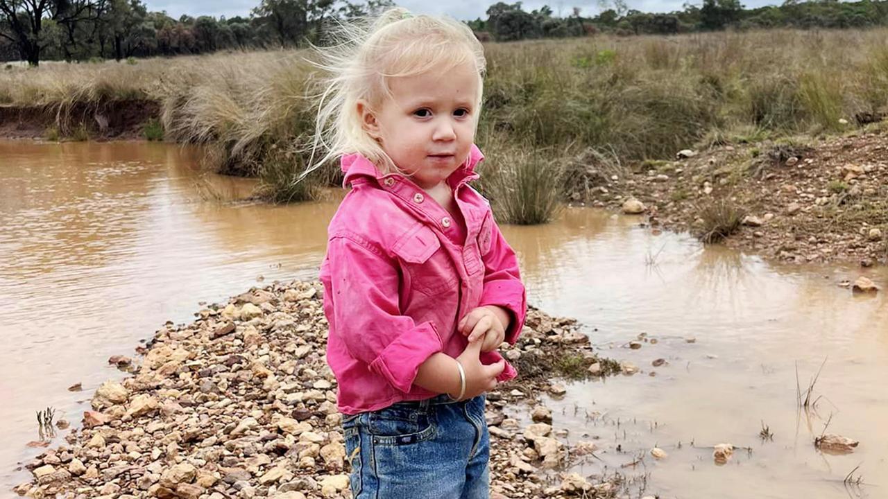 Airlie Rose Crozier, 2, in the wet weather at Beverley Hills in Queensland. Photo: Callum Crozier.