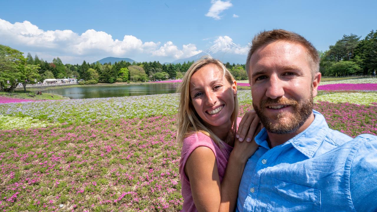 Tourists snap a selfie near Mt Fuji. The strength of the Aussie dollar against the Japanese Yen makes it a good time to visit. Picture: istock