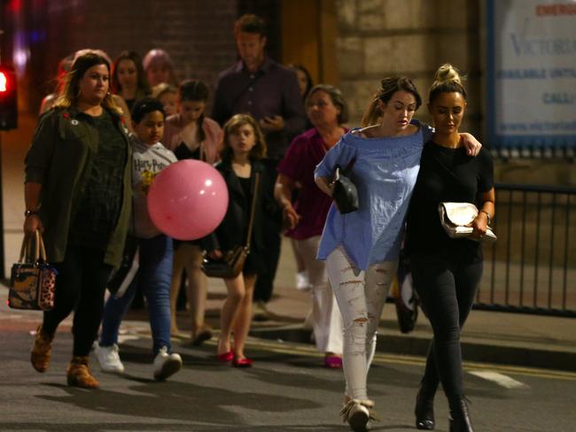 Members of the public are escorted from the Manchester Arena. Picture: Getty