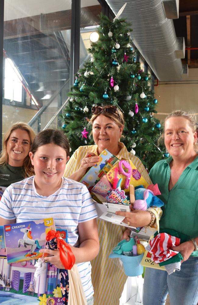 Hope For Our Children Christmas appeal volunteers (back from left) Rebecca Westman, Katrina Hartog and Terri Henningsen with (front) Colbie Moffett. Picture: Rhylea Millar