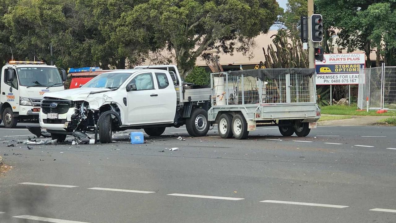 Cars collide on busy intersection during peak hour traffic