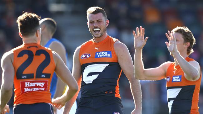 Giants Kieren Briggs celebrates with Josh Kelly after Kelly goal during the AFL Round 19 match between the GWS Giants and Gold Coast Suns at Manuka oval, Canberra on July 22, 2023. Photo by Phil Hillyard (Image Supplied for Editorial Use only – **NO ON SALES** – Â©Phil Hillyard )