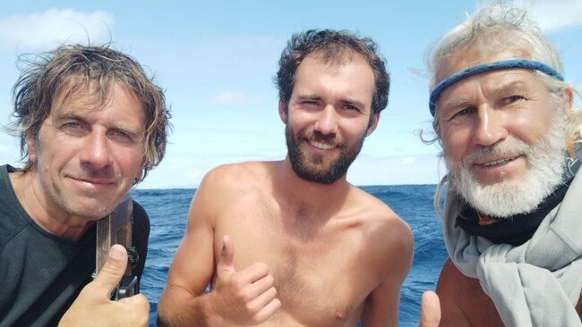 Evgeny Kovalevsky, Vincent Beaujeu and Stanislav Berezkin, the three sailors who were rescued off Cairns coast after their 9m catamaran was attacked by sharks.