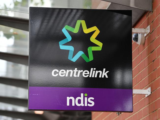 A close up of a Centrelink sign in Norwood, Adelaide. Thursday, April 16, 2020. The Australian Government has announced even tighter restrictions around social gatherings, and boosted stimulus spending, in attempts to fight off the coronavirus and it's affects on the economy. (AAP Image/David Mariuz) NO ARCHIVING