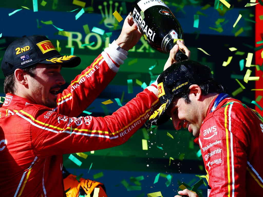 Ferrari’s Charles Leclerc and Sainz celebrate. (Photo by Mark Thompson/Getty Images)