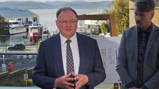 Minister for Children and Youth Roger Jaensch and Department of Education, Children and Young People deputy secretary Peter Whitcombe speak to the media at Parliament Square on Monday May 5, 2025.