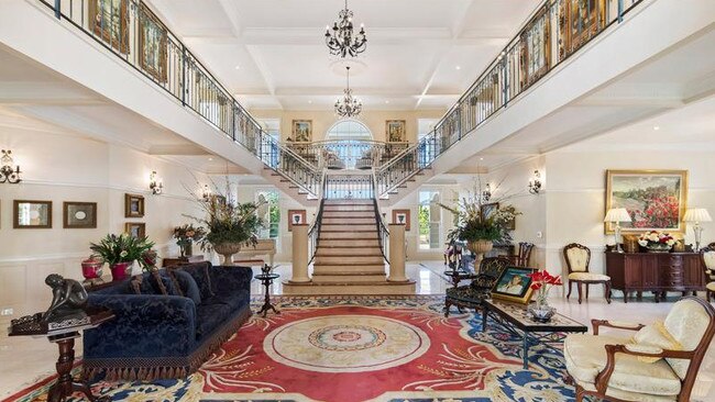 Chandeliers hang above the home’s coffee room.