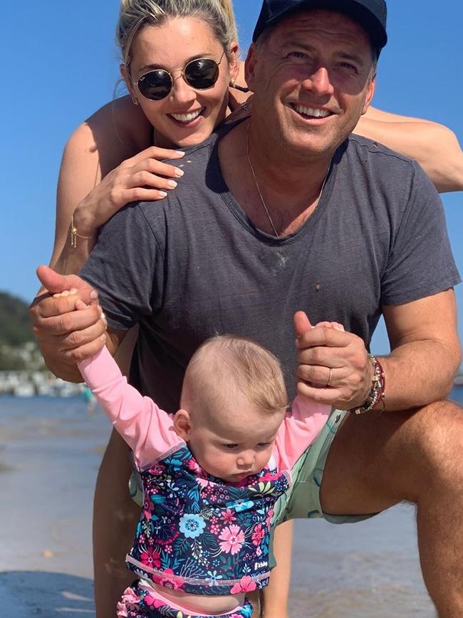 Karl and Jasmine Stefanovic with daughter Harper May at Palm Beach. Picture: Instagram