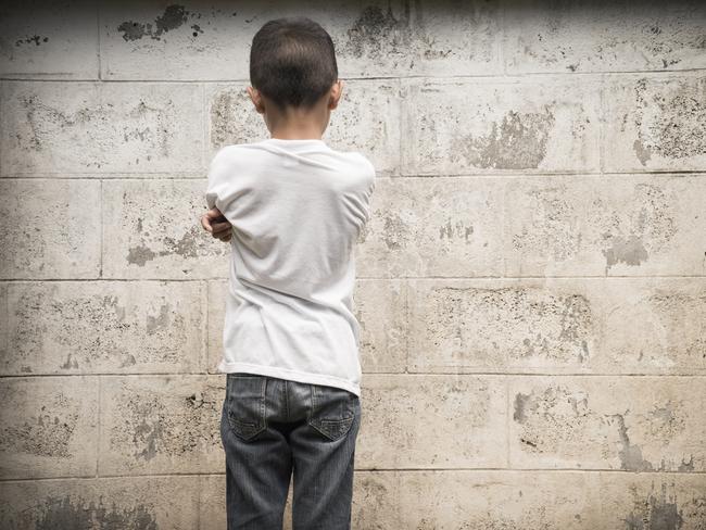 Young Asian boy being physically abused, he is also likely to be emotionally abused. He has no one to stand up and fight for him, his rights or his future. ISTOCK IMAGE