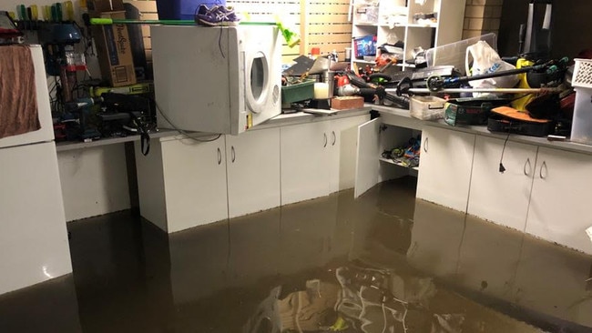 Flooding at the Central Coast home of Darren Bundock, who is now a coach preparing for the Tokyo Olympics