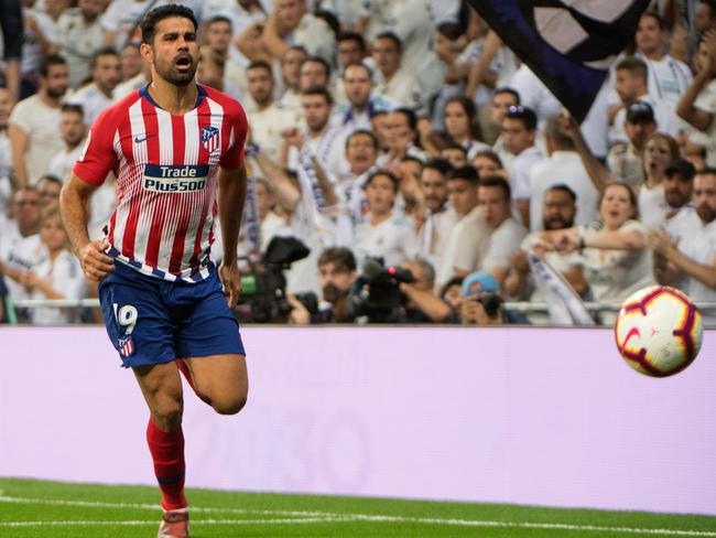 Atletico Madrid's Spanish forward Diego Costa runs for the ball during the Spanish league football match between Real Madrid CF and Club Atletico de Madrid at the Santiago Bernabeu stadium in Madrid on September 29, 2018. (Photo by CURTO DE LA TORRE / AFP)