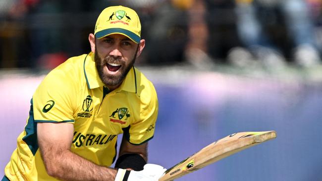 Australia's Glenn Maxwell reacts after playing a shot during the 2023 ICC Men's Cricket World Cup one-day international (ODI) match between Australia and New Zealand at the Himachal Pradesh Cricket Association Stadium in Dharamsala on October 28, 2023. (Photo by Arun SANKAR / AFP) / -- IMAGE RESTRICTED TO EDITORIAL USE - STRICTLY NO COMMERCIAL USE --