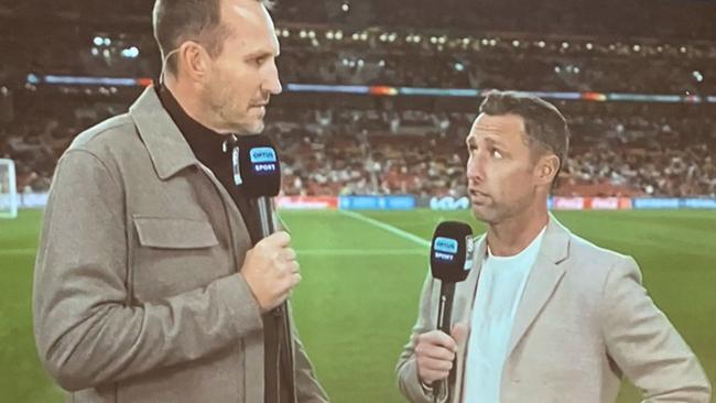 Optus Sport has received backlash due to presenters Mark Schwarzer (left) and Scott Mcdonald (right) covering Saturday's match from the sidelines. Picture: Twitter / @DanielleWarby
