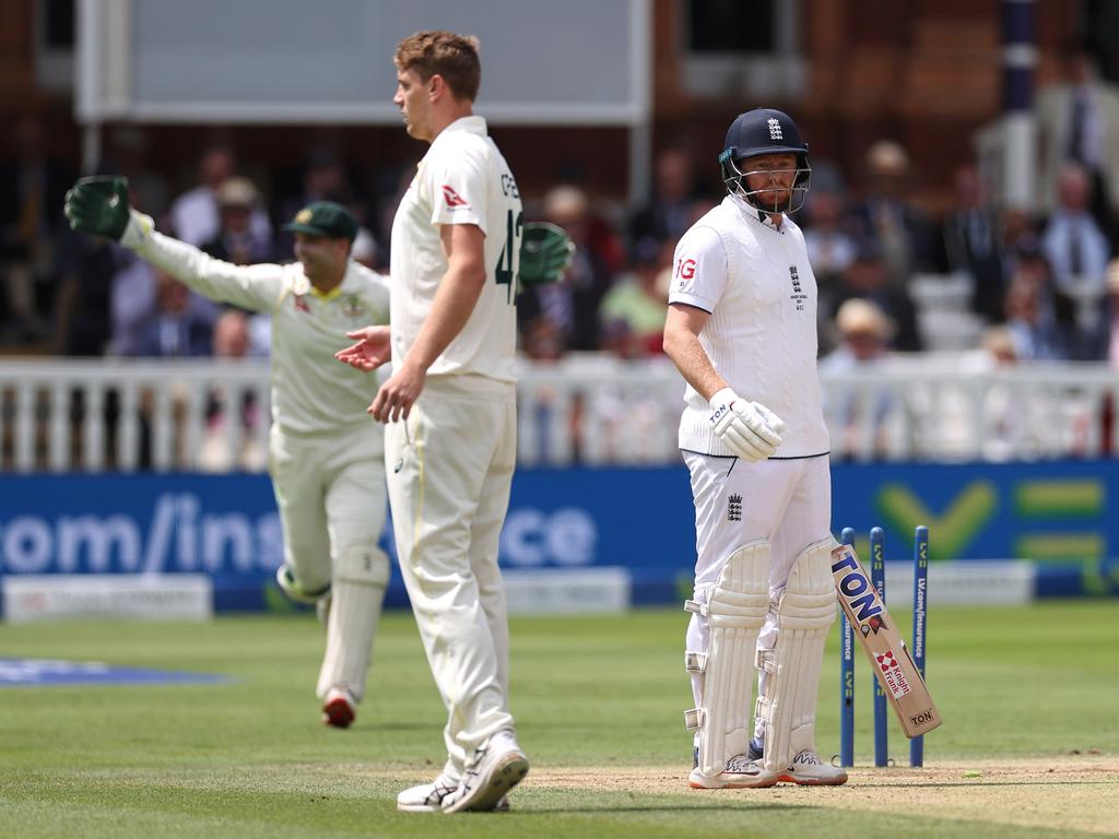 Alex Carey (background) celebrates stumping England’s Jonny Bairstow (R) during the 2023 Ashes. Picture: Getty