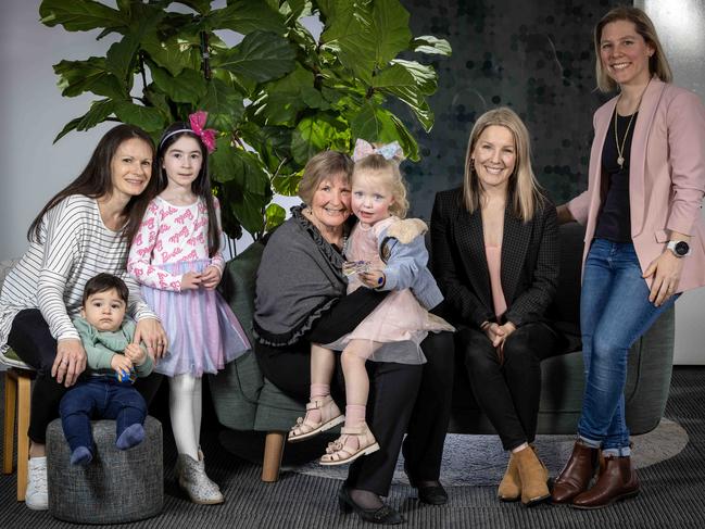 Laura Fotoulis with Alexia and Noah, Dr Christine Kirby holding granddaughter Aria, with Kerin Shearing and Meridee Jensen. Picture: Emma Brasier