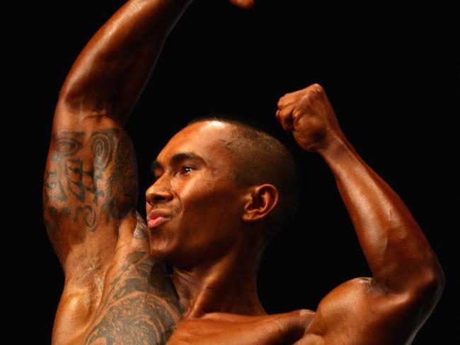 MELBOURNE, AUSTRALIA - OCTOBER 16:  Jonas Vong performs infront of the judges during the 2010 Victorian Body Building Championships at Dallas Brooks Centre on October 16, 2010 in Melbourne, Australia.  (Photo by Quinn Rooney/Getty Images)