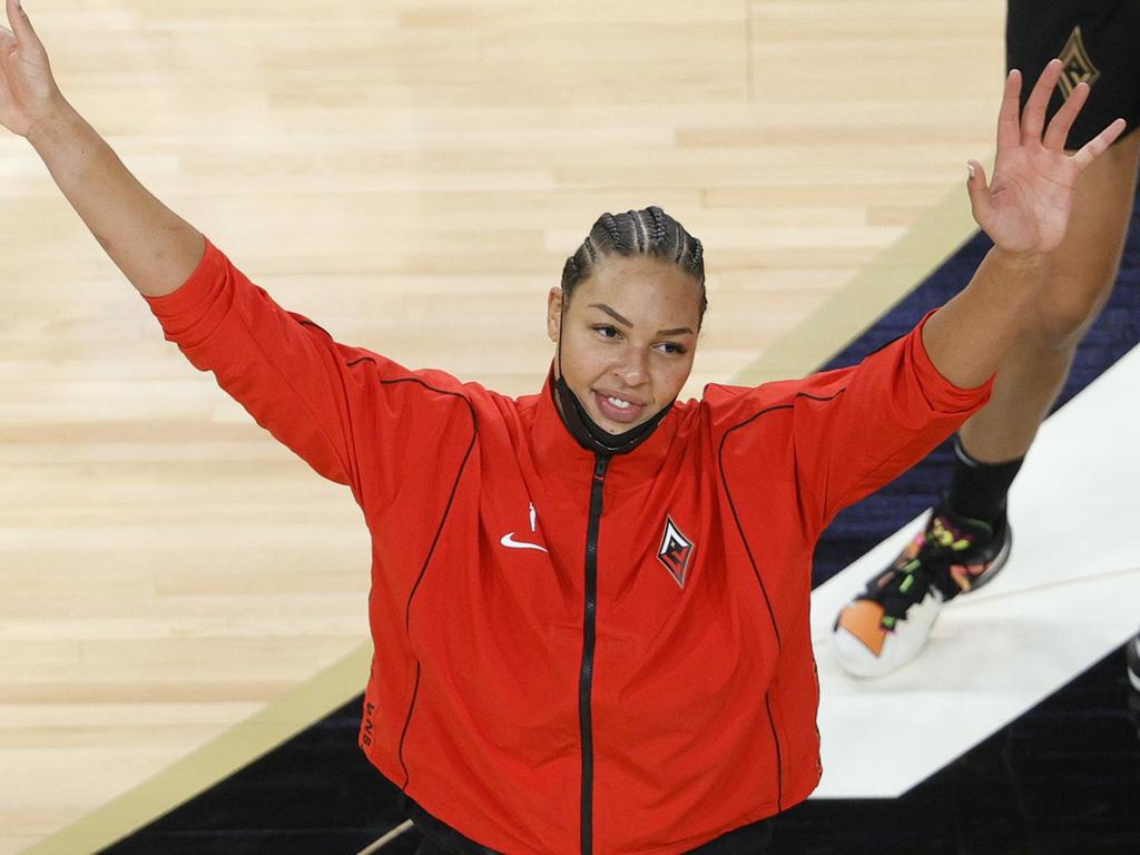 Liz Cambage of the Las Vegas Aces waves to fans. AFP.