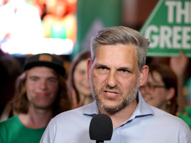 QLDVOTES24 - Michael Berkman  member for Maiwar speaks,  GREENS MPs/candidates arrive, at the Story Bridge Hotel,  Kangaroo Point - on Saturday 26th of October 2024 - Photo Steve Pohlner