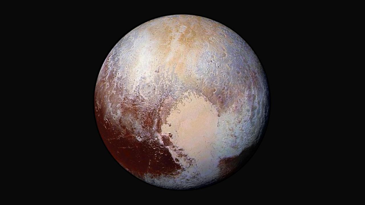 This enhanced colour global view of Pluto was made by combining four images from New Horizons' Long Range Reconnaissance Imager (LORRI) with colour data from the spacecraft's Ralph instrument. Picture: NASA