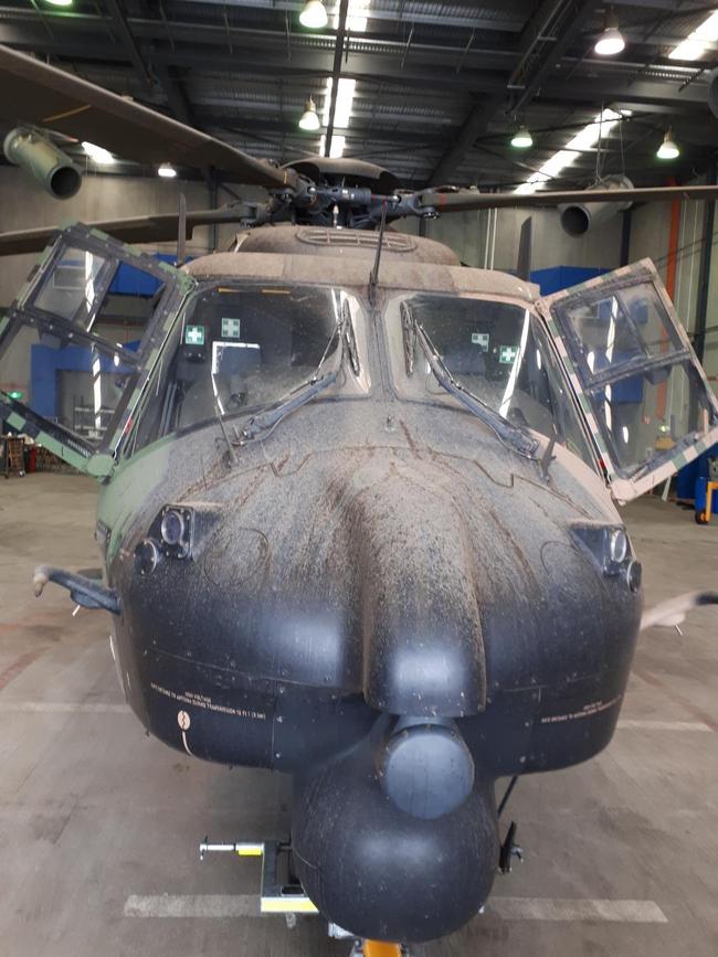 An Australian Defence Force helicopter showing the battle scars of Operation Bushfire Assist. Picture: Twitter