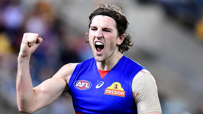 BRISBANE, AUSTRALIA - AUGUST 04: Marcus Bontempelli of the Bulldogs celebrates kicking a goal during the round 20 AFL match between the Brisbane Lions and the Western Bulldogs at The Gabba on August 04, 2019 in Brisbane, Australia. (Photo by Bradley Kanaris/AFL Photos via Getty Images )