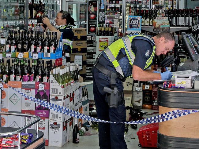 Police believe at least two people were inside the dark-coloured Toyota Hilux car when it smashed into the first bottle shop on Watsonia Road in Watsonia just after 1.30am. Cash and alcohol was stolen. Andres Supa IGA. Picture: Tim Carrafa