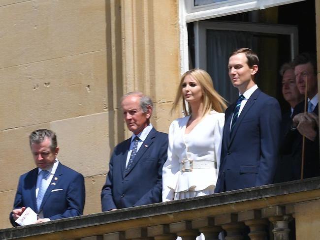 Ivanka Trump and her husband Jared Kushner watch from a balcony as the US President arrives at Buckingham Palace. Picture; AFP