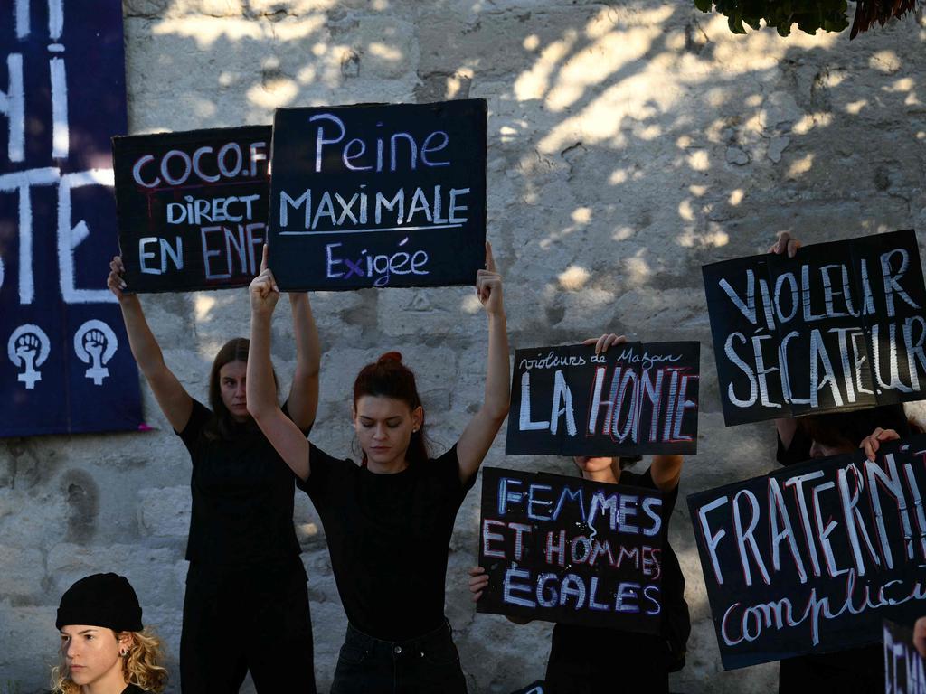 Protesters gathered outside the court. They want a broader legal definition of rape. Picture: Christophe SIMON / AFP