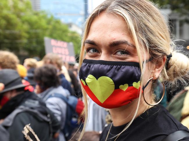 MELBOURNE,AUSTRALIA-NewsWire Photos 26 JANUARY, 2021: Huge crowds walk down Bourke Street Melbourne to properly social distance for the Invasion Day Rally. Picture : NCA NewsWire / Ian Currie