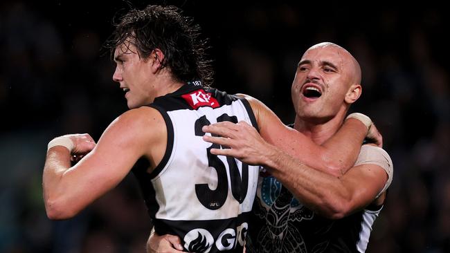 Lord enjoys a goal with teammate Sam Powell-Pepper. Picture: James Elsby/AFL Photos via Getty Images