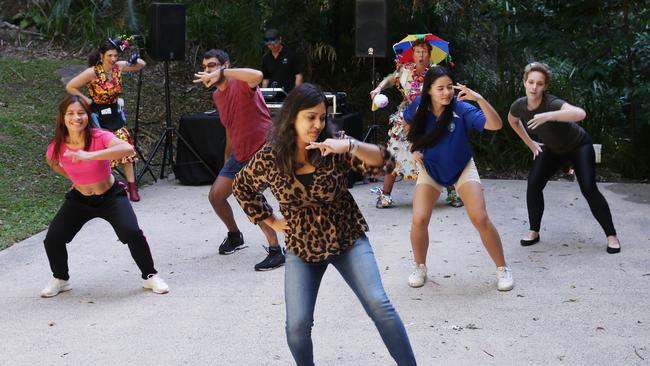 ABollywood inspired flash mob dance at Tanks markets: Cristy Gilvero, Clarissa Marchetto, Josh Crothers, Tharaa Mampilly, Alison Lee, Dani Gilvero and Nerine Flanagan dance outside the Tanks. Picture: Brendan Radke