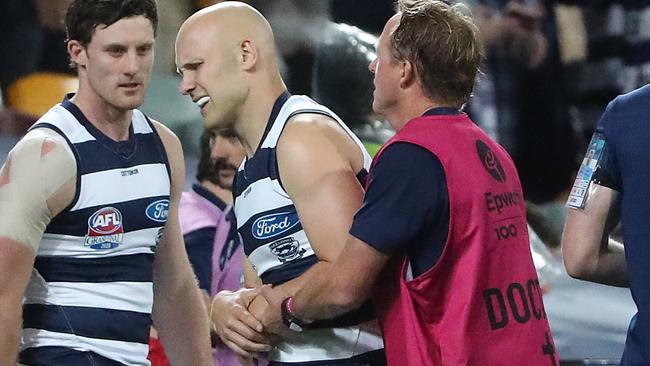 Gary Ablett left the field in agony. Picture: Peter Wallis