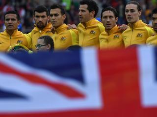 Australia's team lines up during the 2017 Confederations Cup group B football match between Chile and Australia at the Spartak Stadium in Moscow on June 25, 2017. / AFP PHOTO / Kirill KUDRYAVTSEV