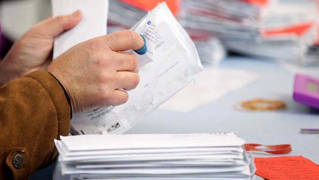 AEC staff count votes for the seat of Hindmarsh in Adelaide last year. Picture: Kelly Barnes