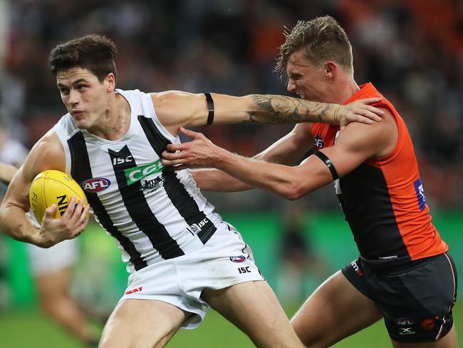 Collingwood's Jack Crisp breaks away from Giants Lachie Whitfield during AFL match GWS Giants v Collingwood at Spotless Stadium. Picture. Phil Hillyard