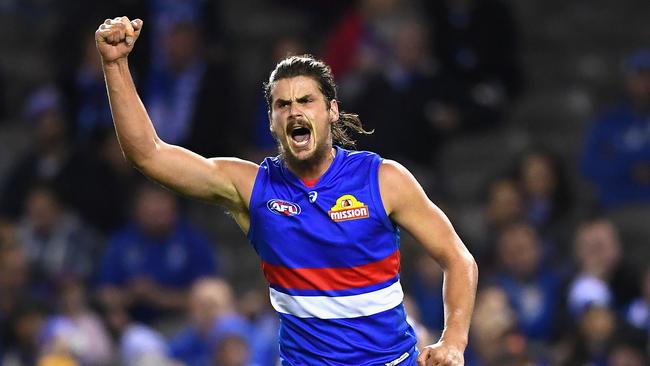 Tom Boyd, pictured celebrating a goal for the Western Bulldogs in 2018, will be strutting his stuff in the VAFA. Picture: Getty Images